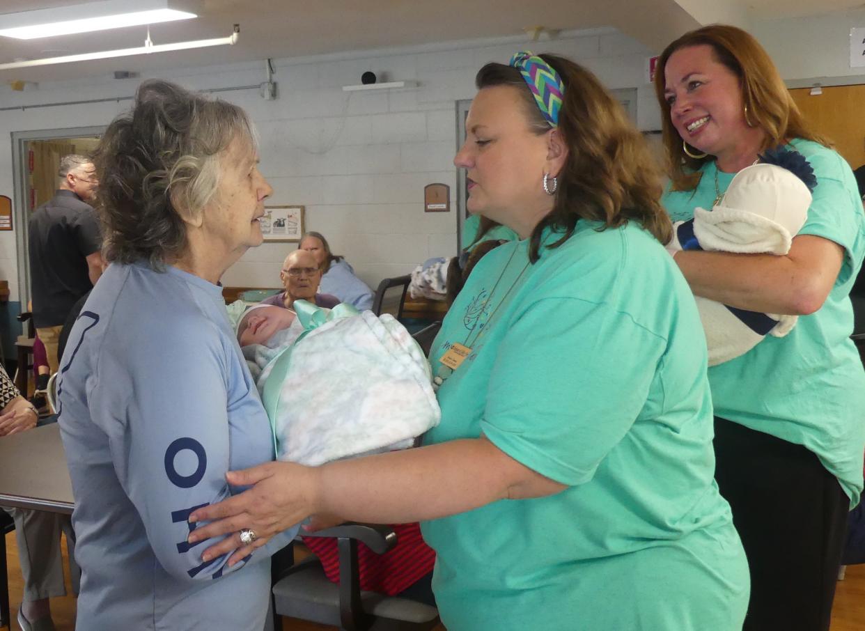 Residents at Embassy of Valley View in Frankfort were filled with joy when receiving their Pearl's Memory Babies and Puppies.