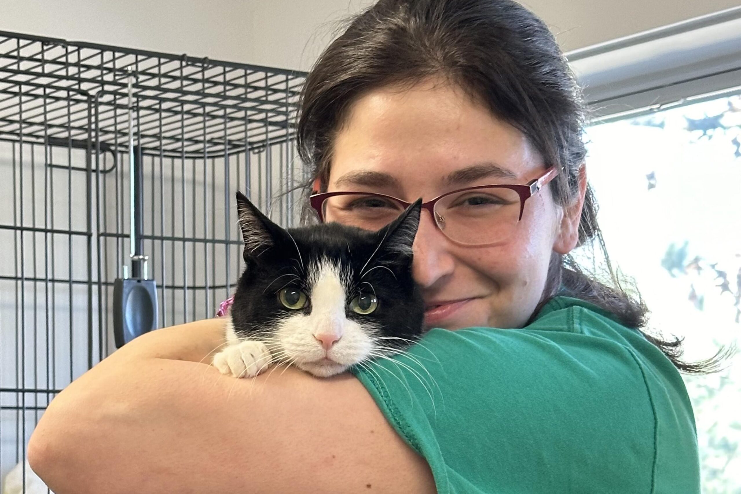 ARF worker Hannah Metcalf and a cat named Julie