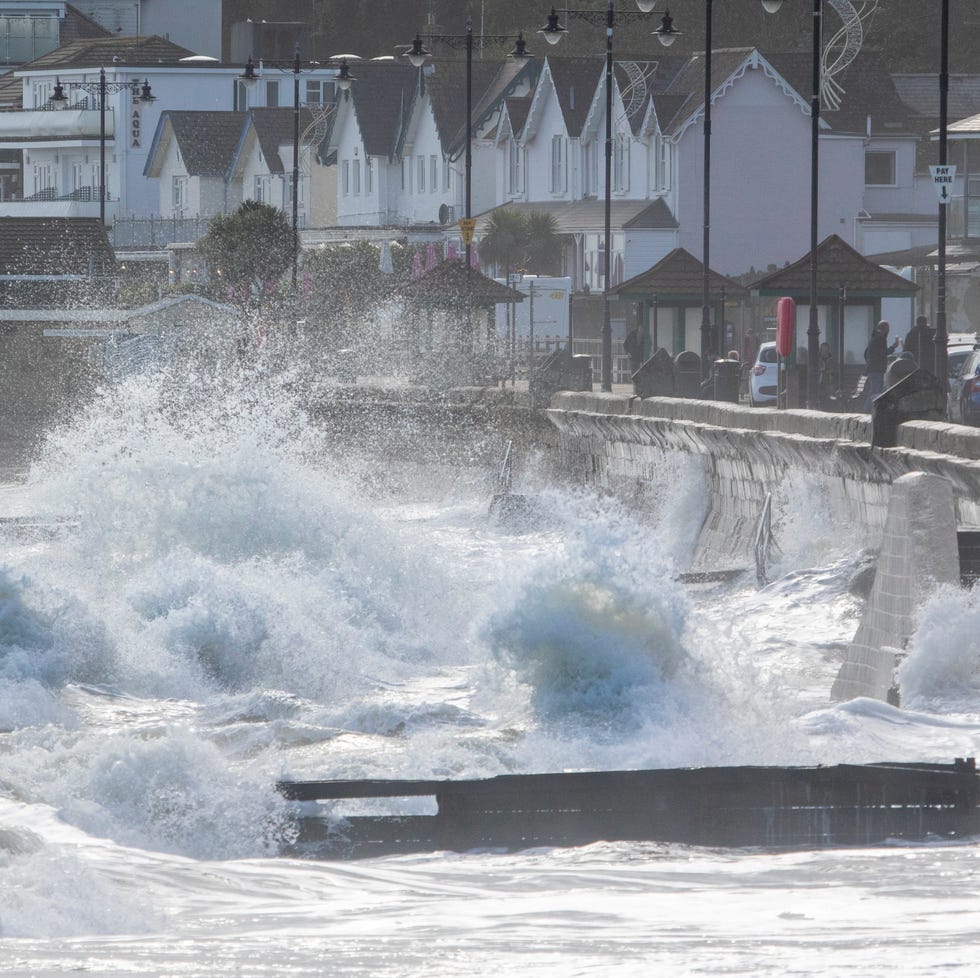 large waves crash into shore