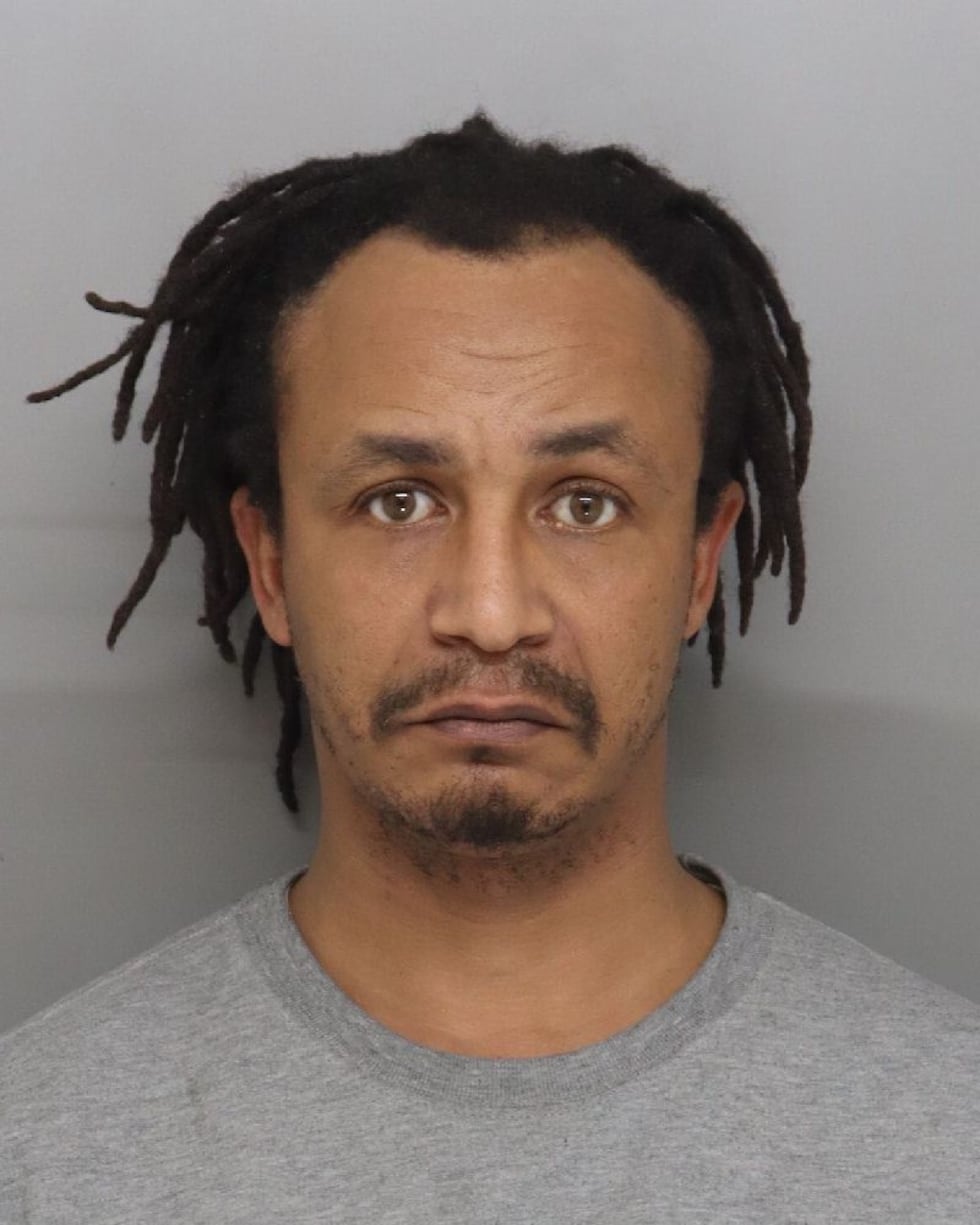 Warren Houston was charged in connection with a dog attack that killed his 3-year-old daughter...