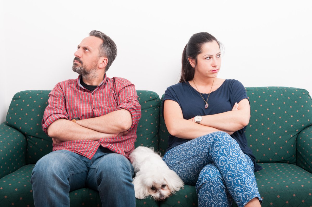 couple fighting on the couch