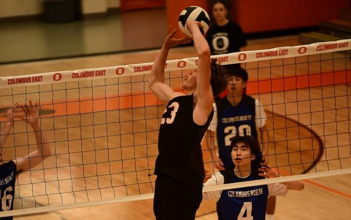 134803611_web1_20250512cr-east-north-volleyball-H