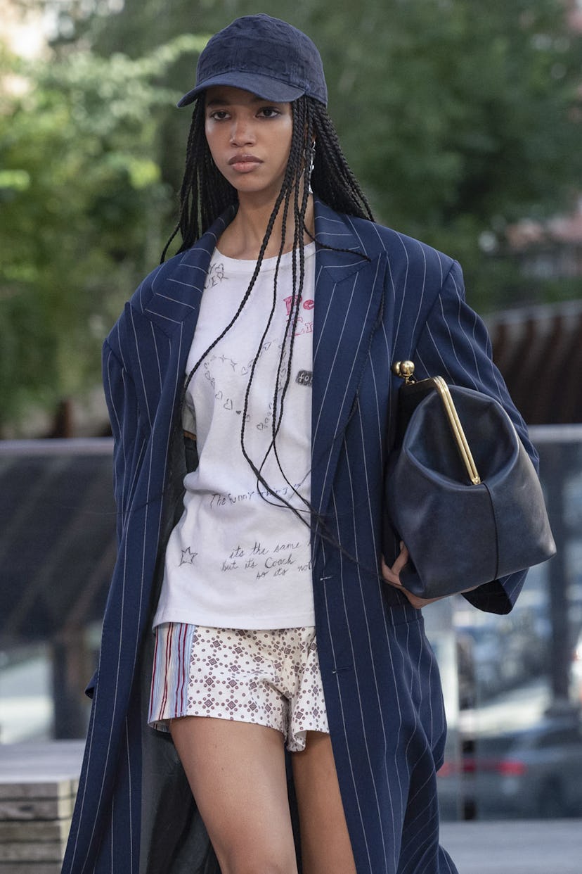 A model walks the runway during the Coach Ready to Wear Spring/Summer 2025 fashion show 