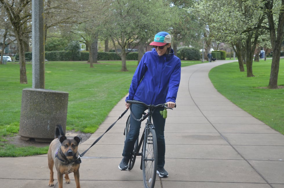 Dog owner with dog on a leash