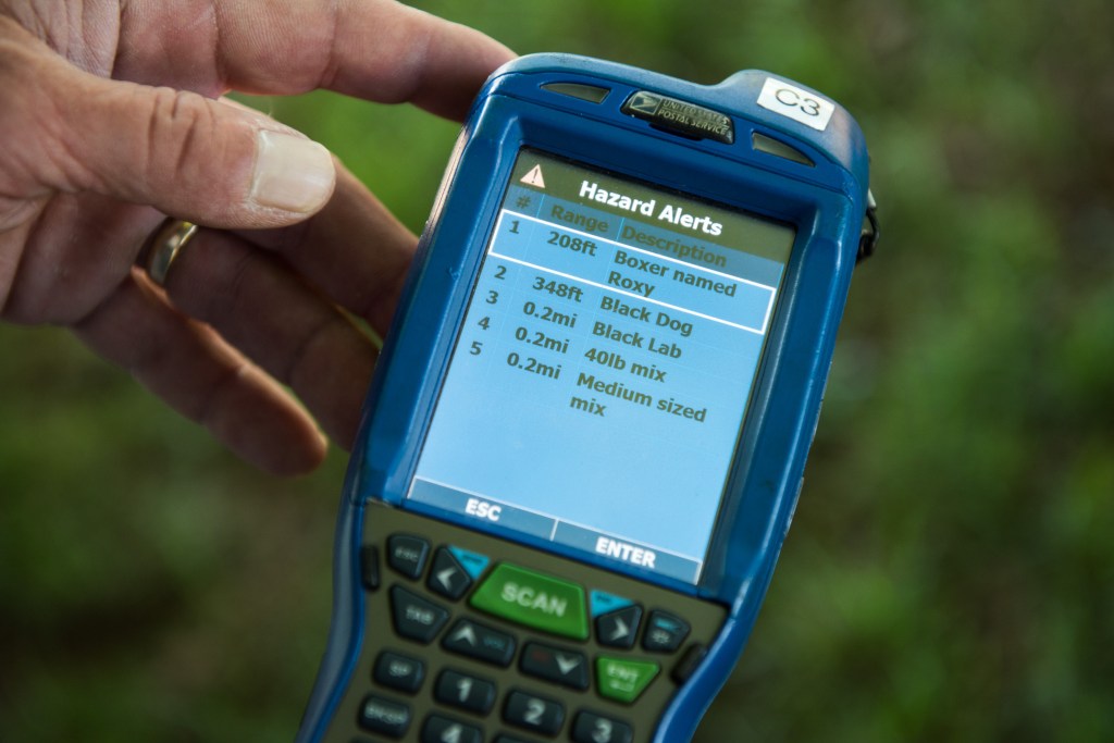Handheld device displaying nearby dogs.